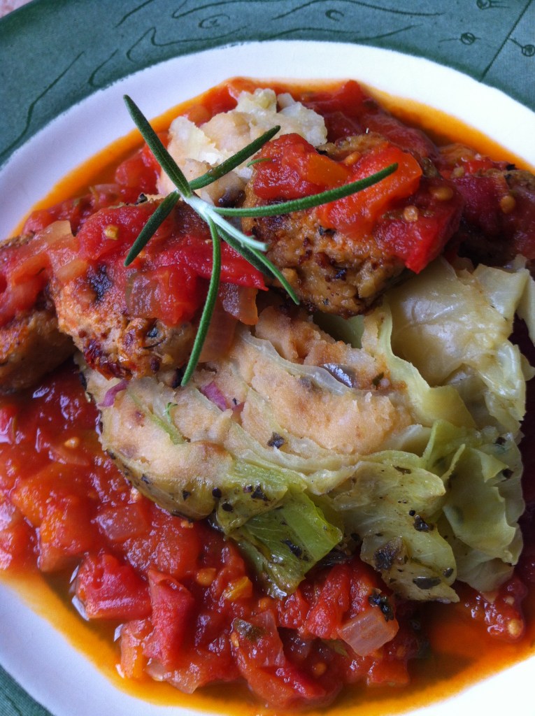 Stuffed Cabbage with Smoked Cheddar Mashers, Tempeh Italian Sausage and Roast Heirloom Tomato Sauce