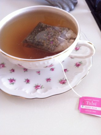 back inside, a hot cup of Tulsi rose