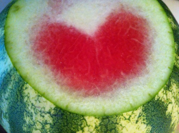 slicing into the watermelon for the going away party, I am confronted with LOVE